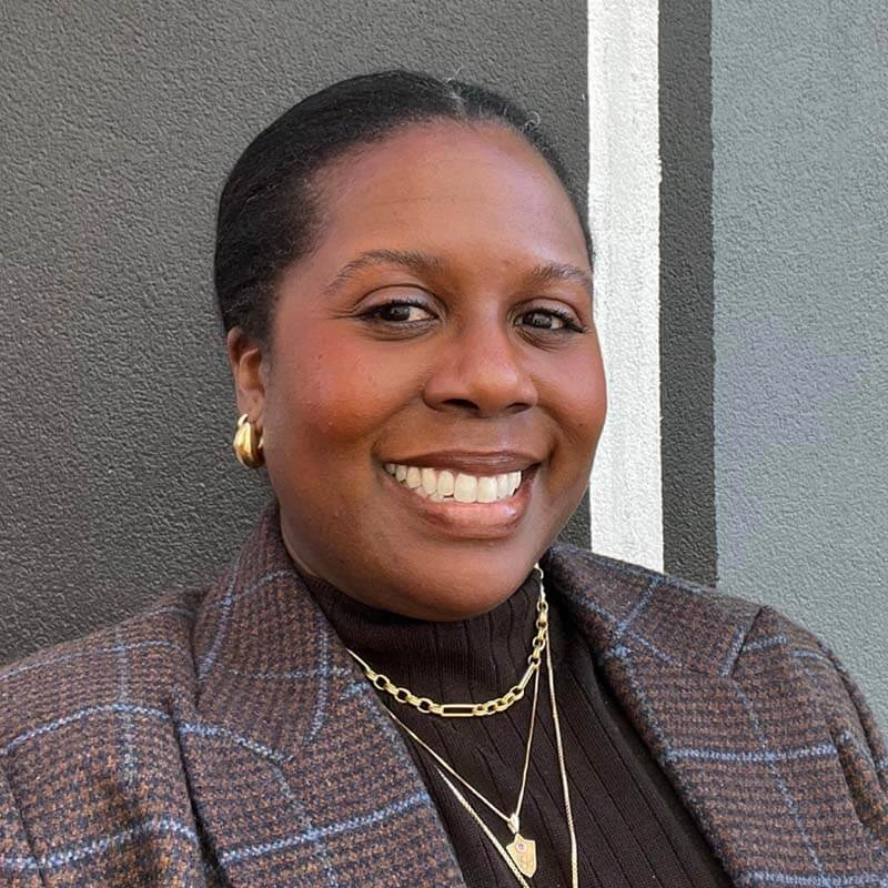 Headshot of Megan Bell, lead designer at Blue Star Design Build.