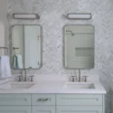 Updated bathroom with double vanity sink in a row home remodel in Logan Circle, Washington DC.
