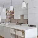 Kitchen remodel with large seated island in a three-level rear addition in Eastern Market, Washington DC.