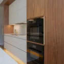 Renovated kitchen with modern finishes in a whole house renovation at the Wharf, Washington DC.